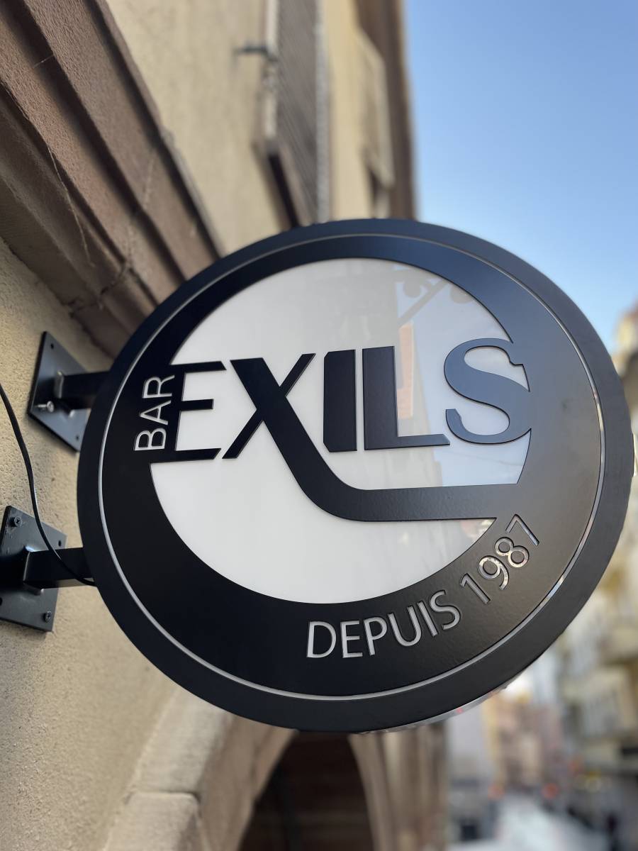 enseigne drapeau lumineuse ronde